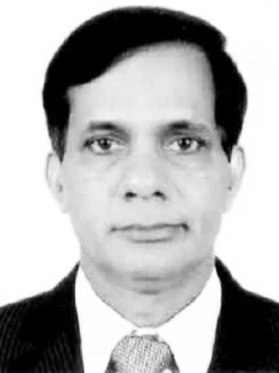 Formal portrait with suit and tie.