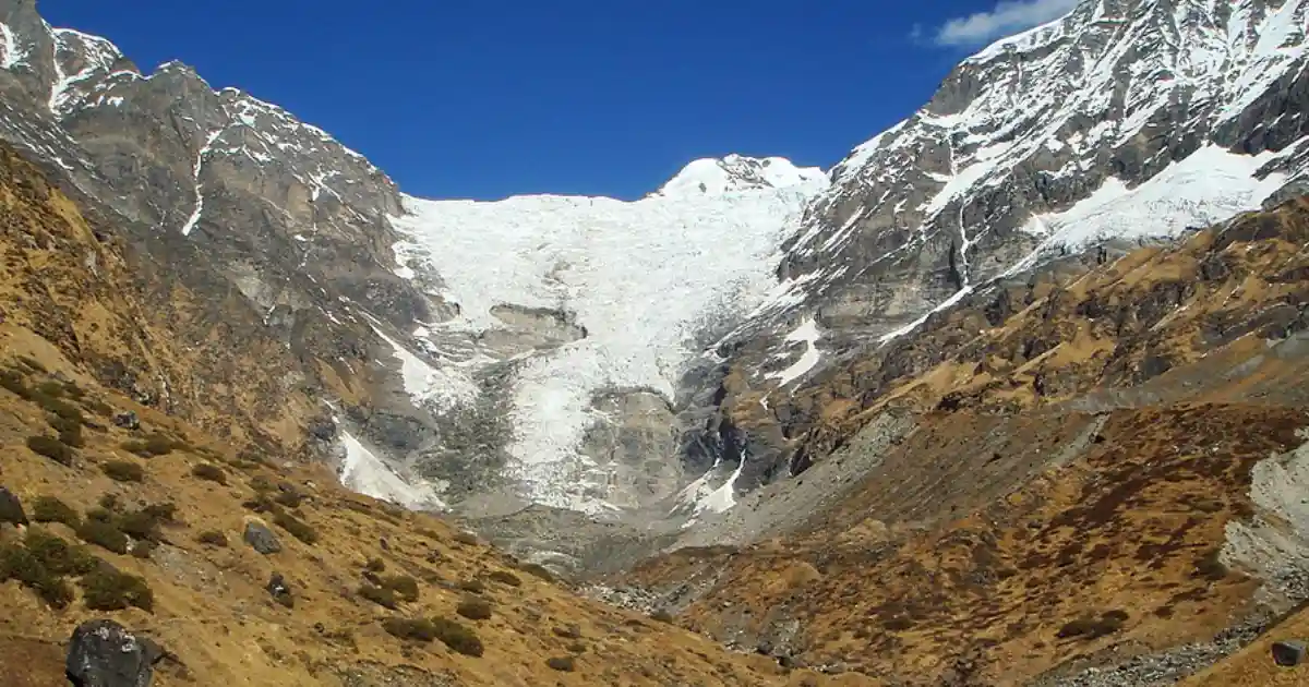 Kafni Glacier surrounded by high Himalayan mountains in the Pindar valley