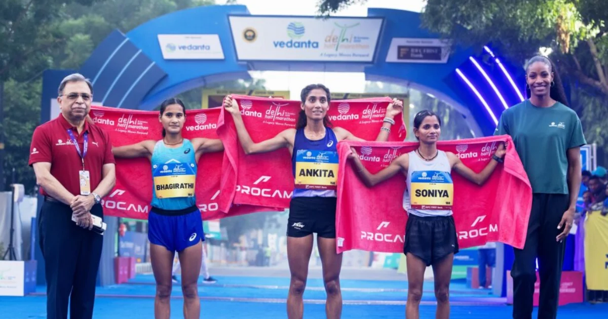 Indian elite women's podium at the Vedanta Delhi Half Marathon 2026 with Ankita Dhyani, Soniya and Bhagirathi Bisht