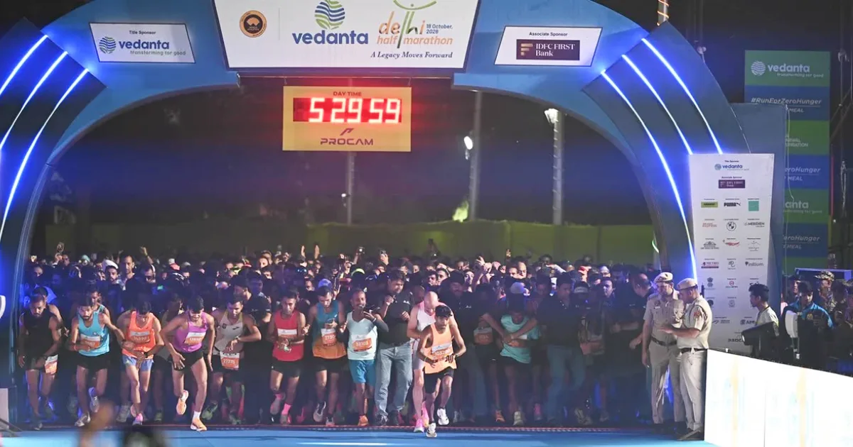 Thousands of runners at the start line of the Vedanta Delhi Half Marathon 2026 in New Delhi